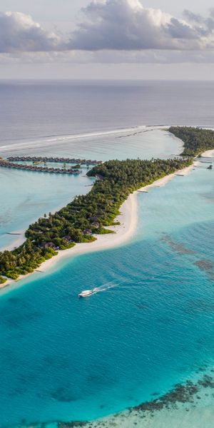 Explore the Maldives: Aerial View of Tropical Island Paradise for Mobile Wallpaper