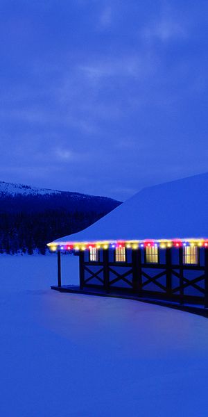 Phone wallpaper: Winter, Night, Snow, Light, House, Cabin, Man Made free download