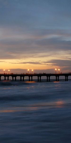 Phone wallpaper: Skyline, Pier, Light, Beach, Ocean, Photography, Earth, Sunset, Landscape free down