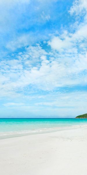 Breathtaking Tropical Beach Wallpaper: Sea, Horizon, and Clouds