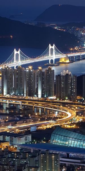 Awesome Night Cityscape of Busan with Vibrant Blue Lights