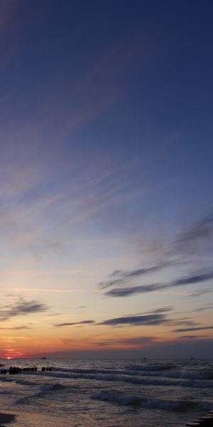 Serene Twilight Beach Wallpaper: Waves, Sunset, and Nature's Beauty