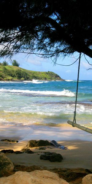 Relaxing Beach Scene with Swing - 4K iPhone Wallpaper for Nature Lovers