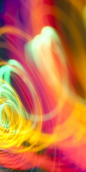 Captivating multicolored spiral mobile wallpaper radiating brilliance and light