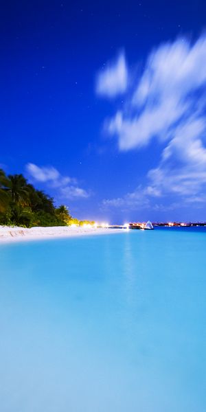 Tranquil Nighttime Beach Scene - Ideal iPhone Background for Relaxation
