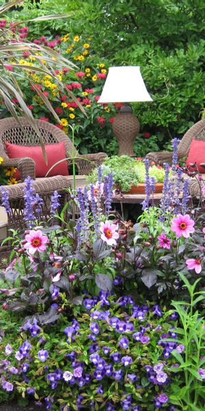 Charming Garden Seating Surrounded by Vibrant Flowers