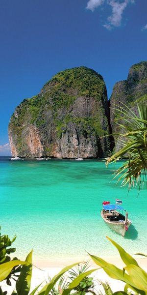 Breathtaking Beach Landscape with Boats for Your Phone Wallpaper