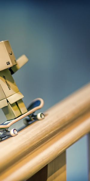 Whimsical Skateboarding Danbo on a Mobile Wallpaper
