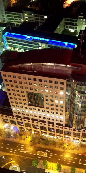 Captivating cityscape wallpaper featuring illuminated buildings and streets