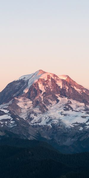 Breathtaking Snow-Covered Mountain at Sunset