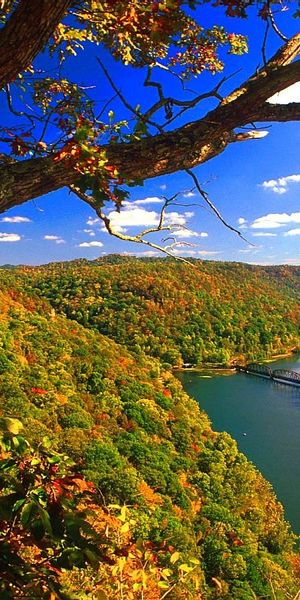 Breathtaking Earth Landscape Wallpaper Featuring a Serene River and Autumn Colors