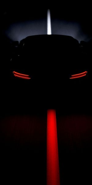 Captivating Dark Car Wallpaper with Bright Headlights