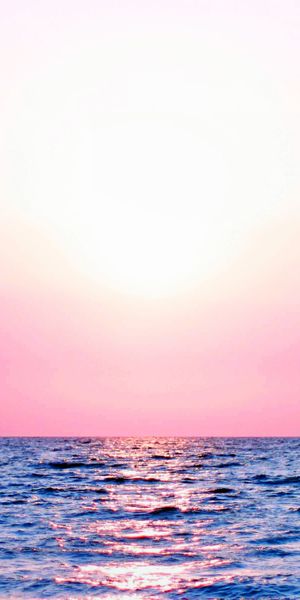 Beautiful pastel sunset wallpaper for iPhone featuring colorful sea and sky