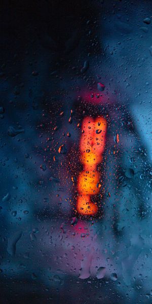 Vibrant Wet Glass Wallpaper with Colorful Water Drops