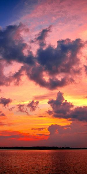Breathtaking 4K phone wallpaper of Earth at sunset with vibrant colors