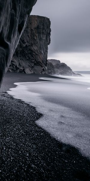 Dark Beach with Rocks and Ocean Waves for Your Phone Wallpaper