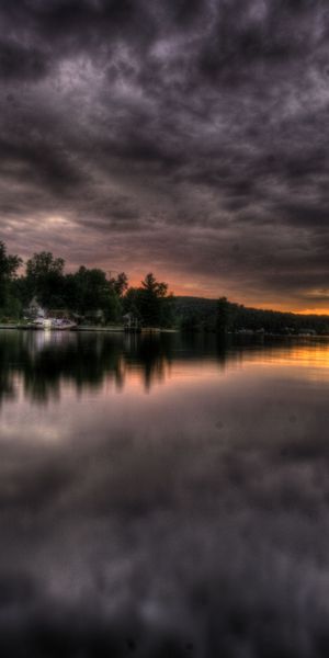 Breathtaking HDR sunset wallpaper featuring a calm lake in 4K resolution