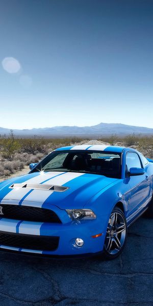 Blue Shelby Mustang on Desert Road - A Perfect Phone Wallpaper