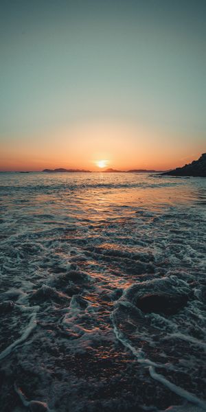 Beautiful Sunset Over the Sea Waves
