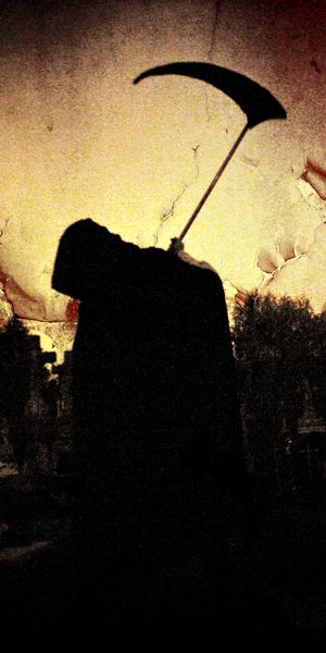 Dark Grim Reaper in a Haunting Cemetery Scene