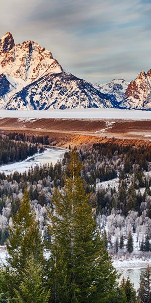 Explore a Majestic Snow-Capped Mountain Landscape - Free iPhone Wallpaper