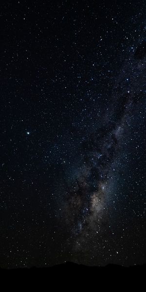 Breathtaking Dark Nebula with Stars and Hill Silhouette