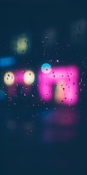 Bokeh Rain Drops on Glass—Aesthetic Mobile Wallpaper