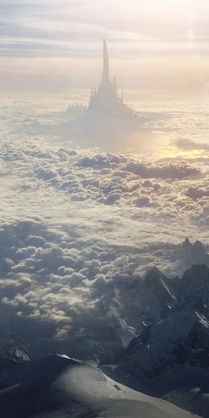 Breathtaking fantasy wallpaper with a castle, mountains, and ocean views