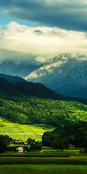 Serene 4K Landscape Wallpaper: Majestic Mountains and Lush Valleys