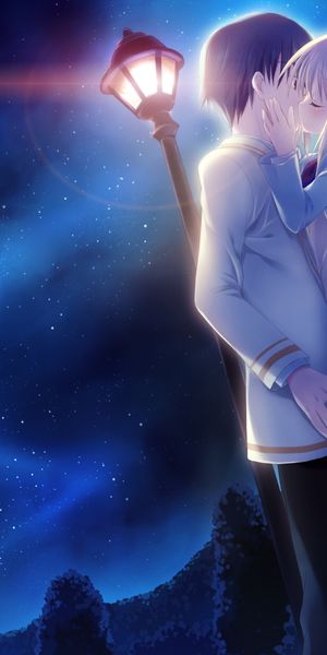 Enchanting 4K mobile wallpaper featuring a kiss between anime characters under a starry sky