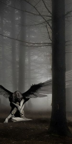 Gothic Angel with Wings in Dark Forest