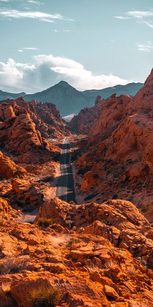 Majestic Valley Landscape with Scenic Road and Mountains