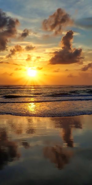 Beautiful Sunset Over the Sea with Gentle Waves