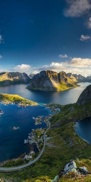 Breathtaking Coastal Village Landscape with Lake and Mountains