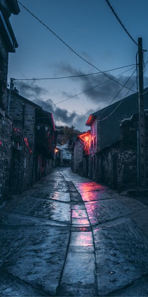 Enchanting Night Street with Lanterns and Shimmering Lights