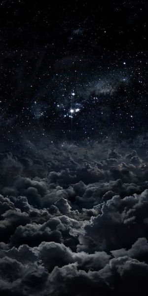 Breathtaking 4K Mobile Wallpaper of a Starry Night Sky with Clouds