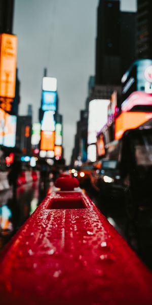 Night View of Times Square with Wet Handrail