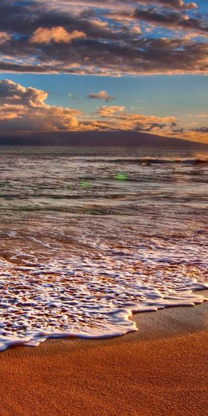 Breathtaking High-Quality Phone Wallpaper of a Beach Sunrise Over the Ocean