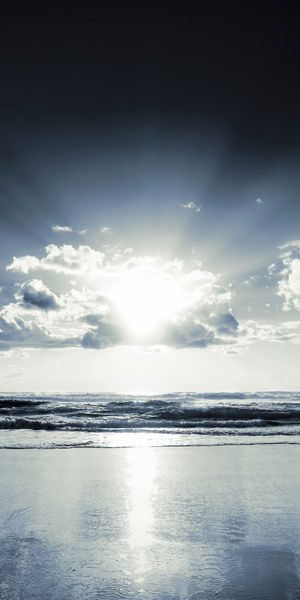 Breathtaking iPhone wallpaper featuring a tranquil shoreline and ocean horizon