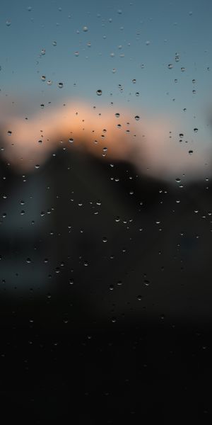 Amazing Rain Drops on Glass Creating a Soft Silhouette Effect