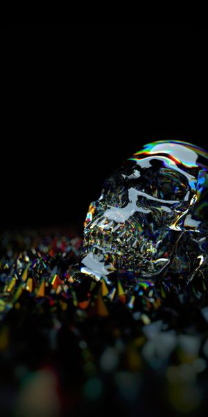 Vibrant mobile wallpaper featuring a glass skull with multicolored brilliance