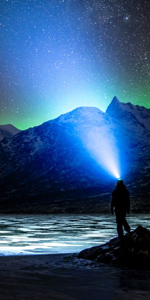 Phone wallpaper: Human, Flashlight, Starry Sky, Person, Night, Northern Lights, Dark, Aurora Boreali