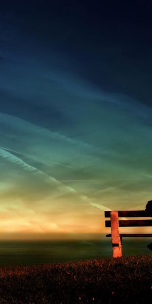 High-Quality Mobile Wallpaper: Serene Night Scene with a Person on a Bench
