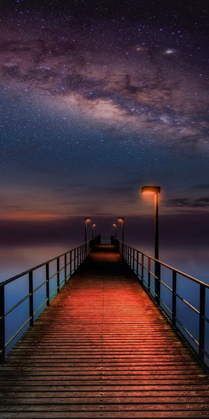 Milky Way Illuminating the Pier Under a Starry Sky