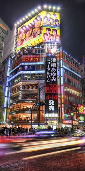 Captivating Tokyo Nightlife: Billboards and Bustling Streets for Phone Wallpaper