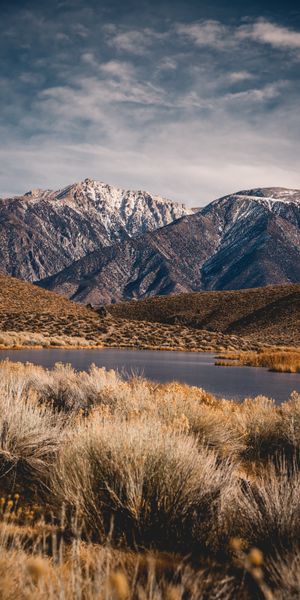Awesome Mountain Landscape with Tranquil Lake and Lush Valley