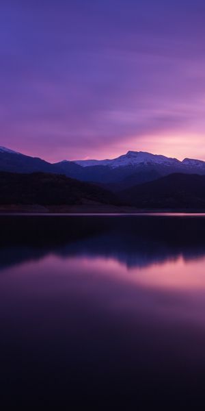Breathtaking Nighttime Mountain Reflection Over a Tranquil Lake