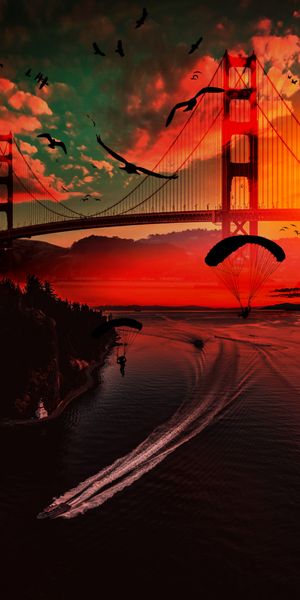Breathtaking View of Parachutists Over Golden Gate at Sunset