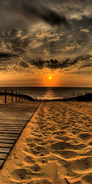 Beautiful Sunset at the Beach with Scenic Road