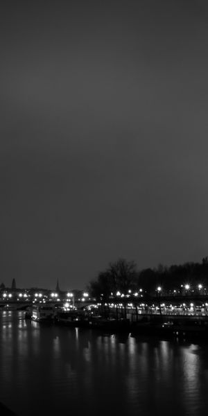 Elegant Black & White Mobile Wallpaper Featuring the Eiffel Tower and River Seine